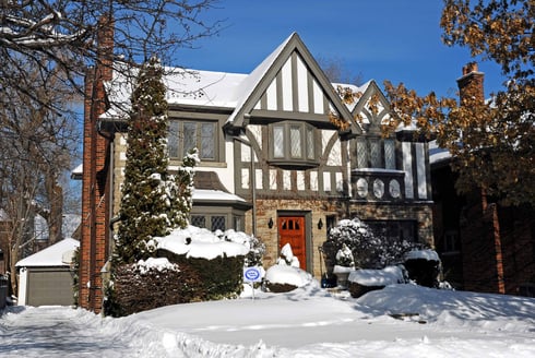 snow covered house in winter